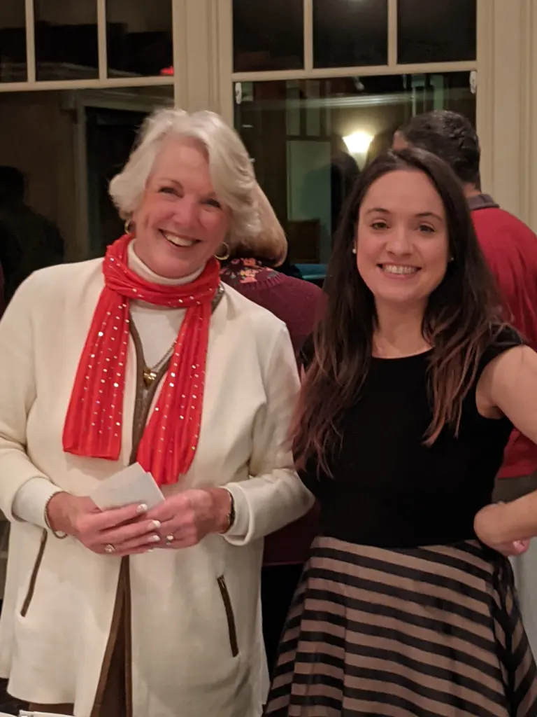 Wendy and Renee greeting guests as they arrive